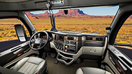 Peterbilt Model 579 Diesel On-Highway Interior Cab POV on Long Highway with Red Rock Mountains in Background - Thumbnail